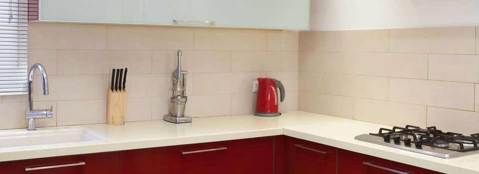 Luxury Kitchen With Red And Marble Elements